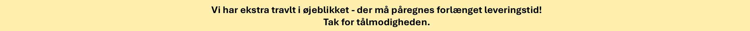 Danish notice banner on pale yellow background informing of a busy period and possible delayed delivery; thanks for patience.